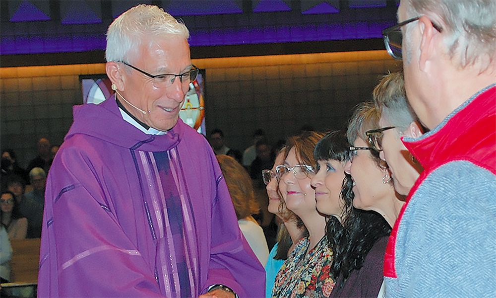 Pastor installed at new parish on Madison’s east side